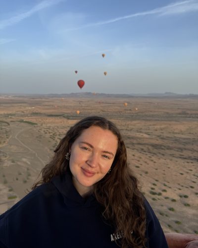 Amy smiling while outside